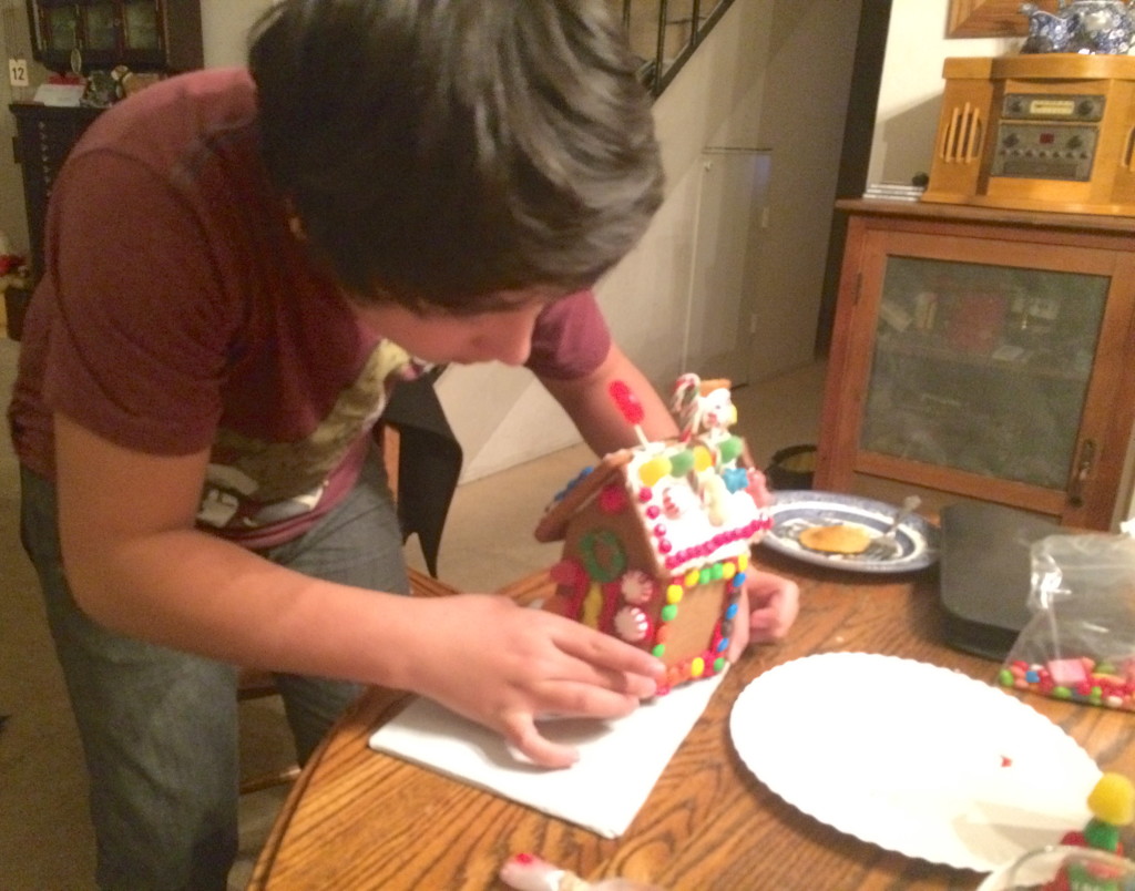 decorating gingerbread houses with candy