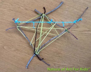 Making art out of twigs, string and yarn, great preschool kids craft and holiday art making