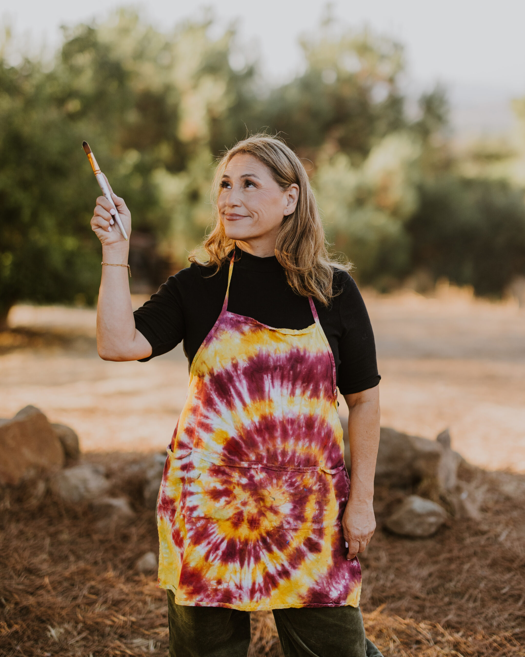 Art Instructor, Spramani Elaun, Nature of Art. Image of art teacher